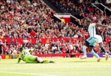 Taiwo Awoniyi scores their side's first goal of the game during the Premier League against Manchester United