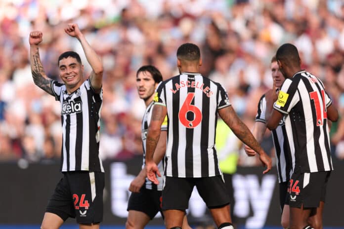 Newcastle United players cheering after scoring