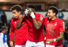 Taiwo Awoniyi celebrates scoring with Johnson and Lingard