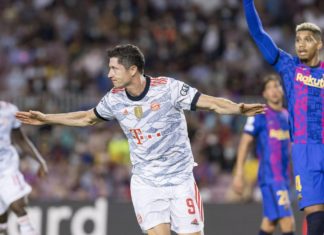 Lewandoswki's Double Helps Bayern Ease Past Barcelona