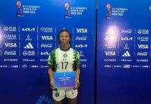 Opeyemi Ajakaye receiving an award